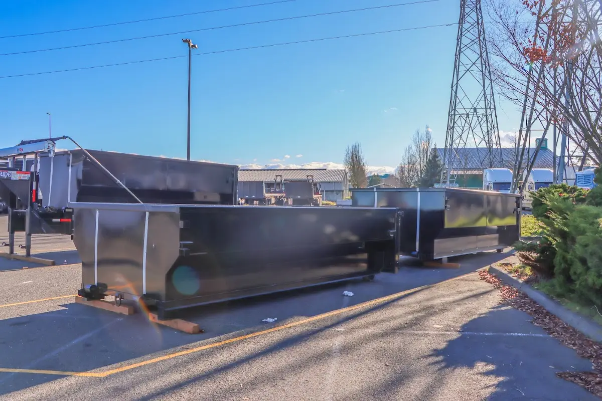 Roll-off dumpster ready for waste disposal at job site for Commercial Dumpster Rental in Chattanooga